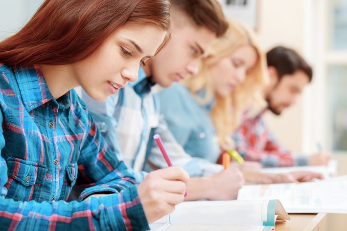 Four students of United States preparing for SAT for college admissions